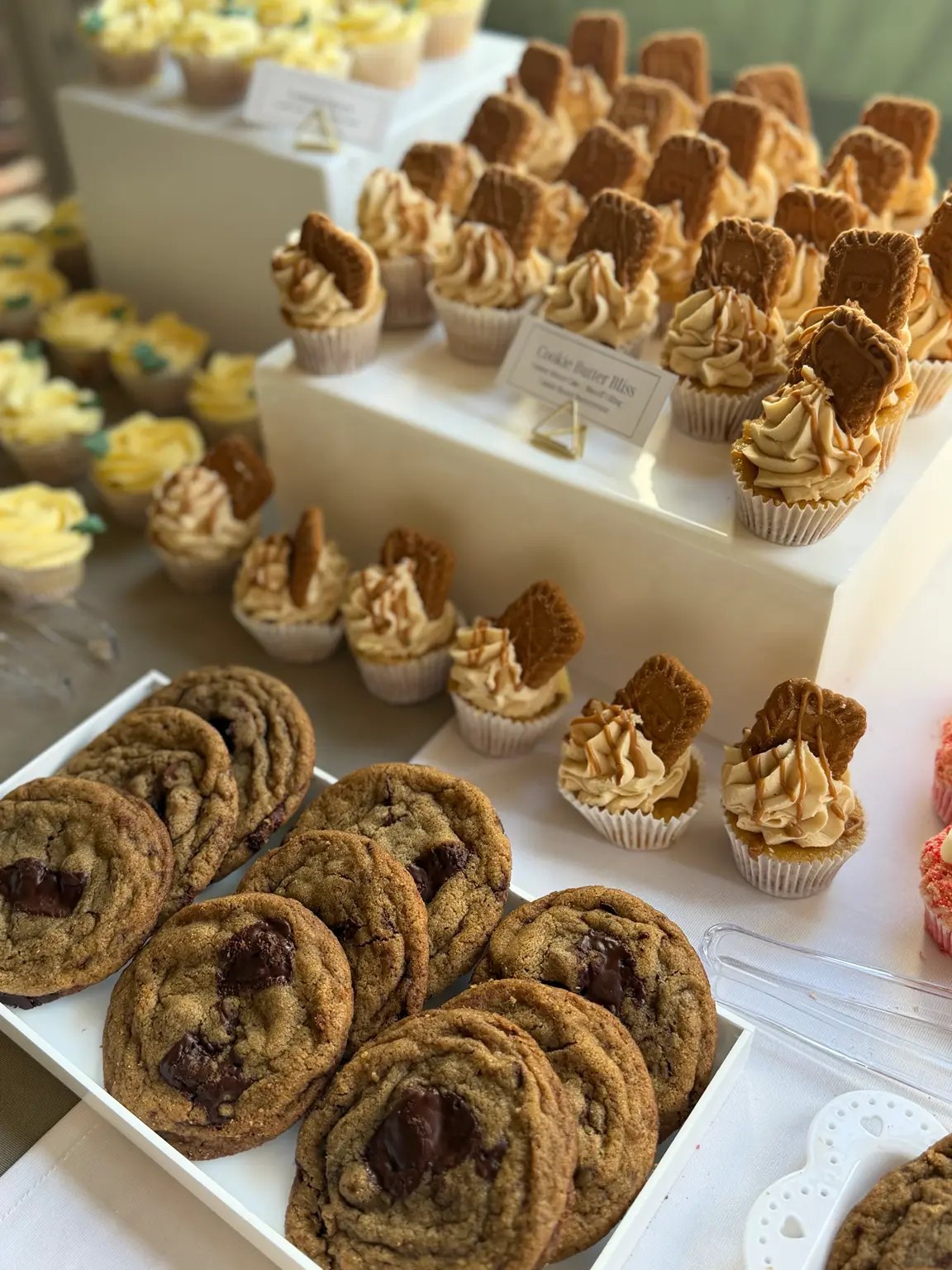 Cookie Butter Bliss cupcakes and cookies at an event