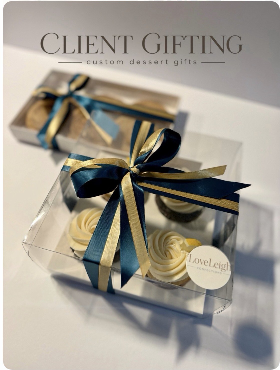 Cupcake gift box tied with teal and gold ribbon