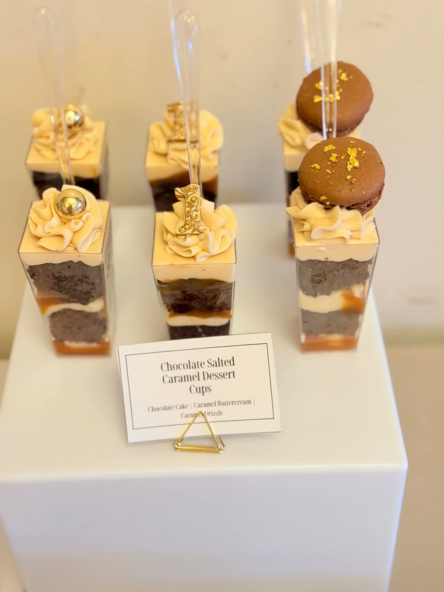 Chocolate salted caramel dessert cups with caramel buttercream and gold accents